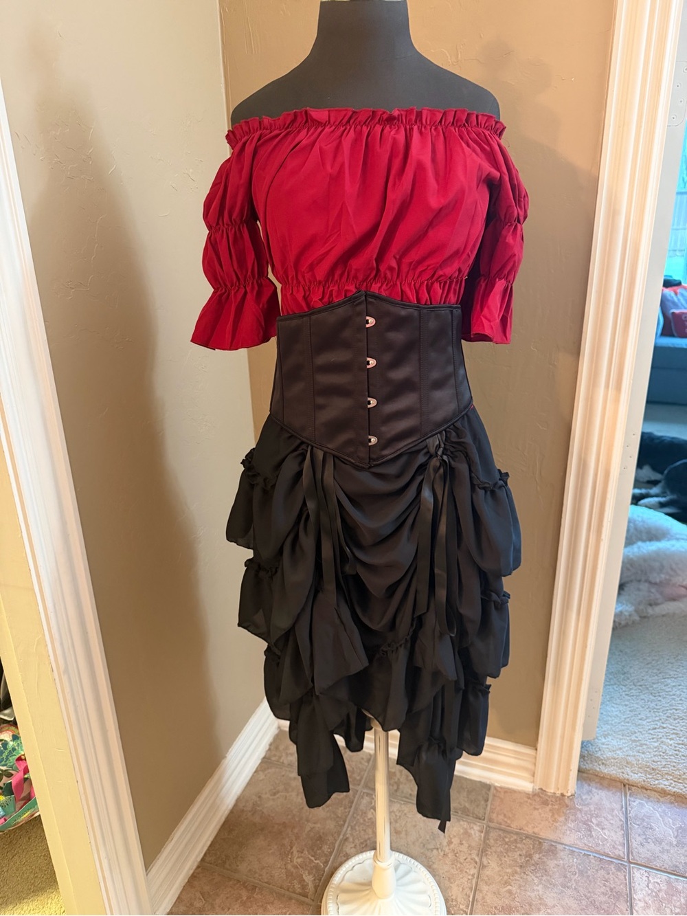 Amazon Red Off-Shoulder Top with Black Corset and Asymmetrical Ruffled Skirt
